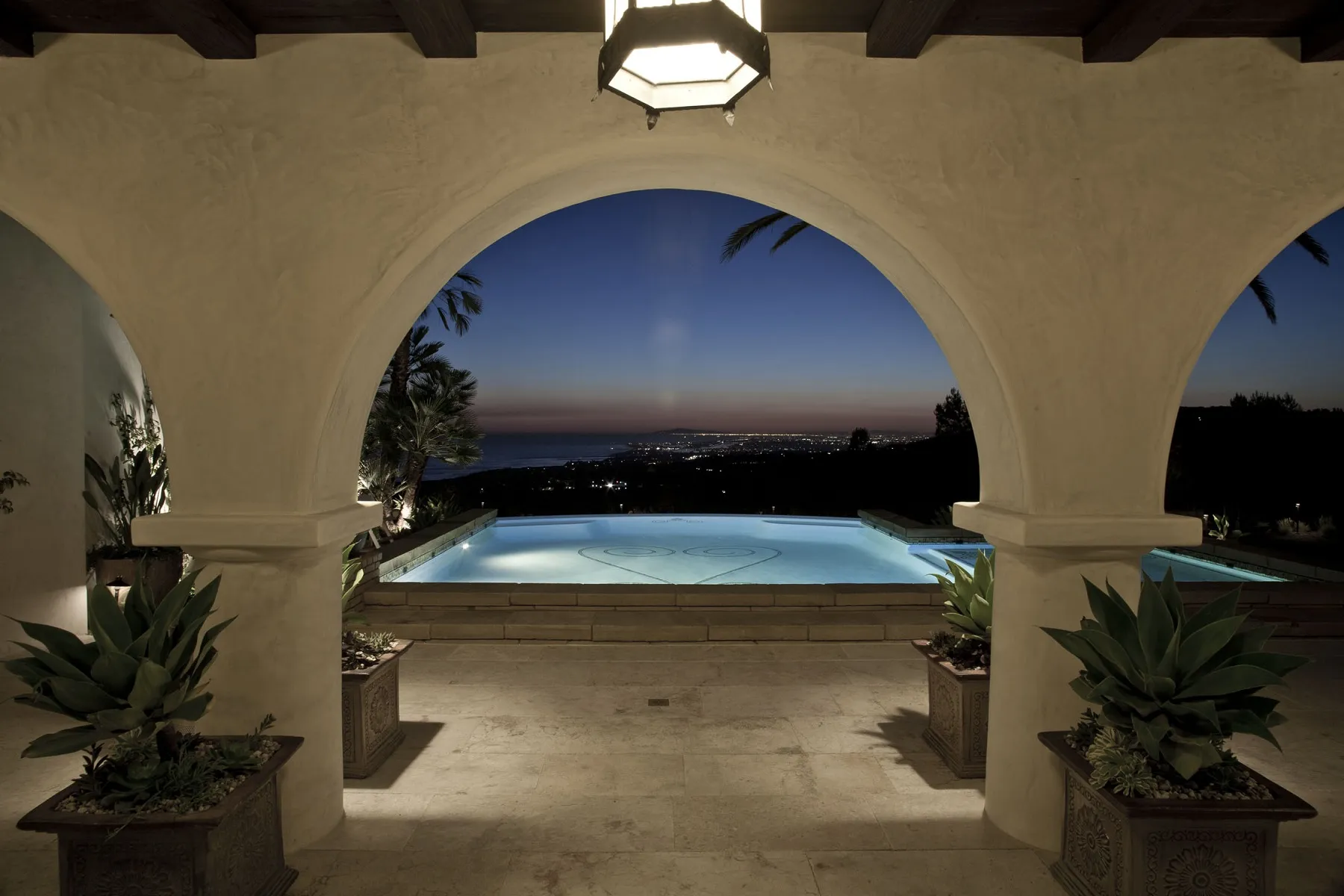 Spanish courtyard pool and villa in Newport Coast